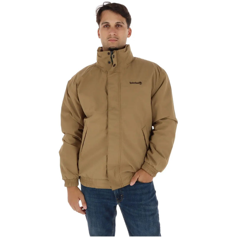 Timberland Doudoune homme beige à col montant et fermeture éclair sur le devant, vue de face