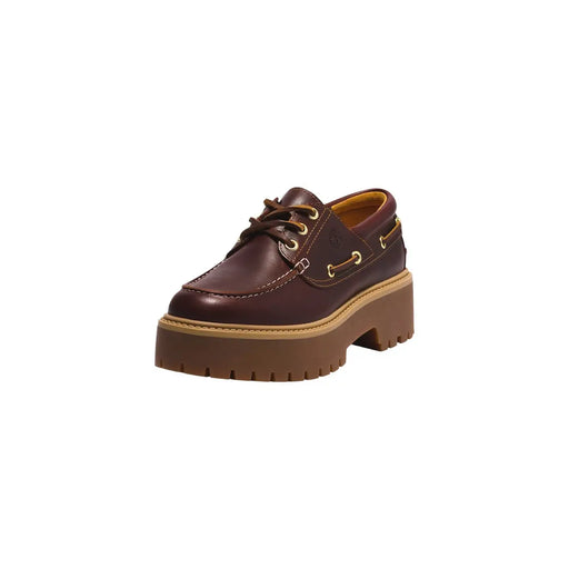 Timberland Chaussures à lacets en cuir bordeaux pour femme, avec plateforme en cuir marron, œillets dorés et semelle en caoutchouc beige.