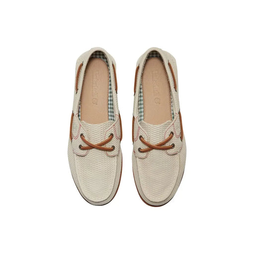 Timberland Mocassins en cuir beige pour femme, avec cuir texturé couleur crème, lacets couleur camel et coutures marron.