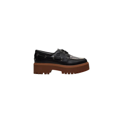 Timberland Chaussure à plateforme en cuir noir pour femme, avec bout texturé et semelle en caoutchouc marron