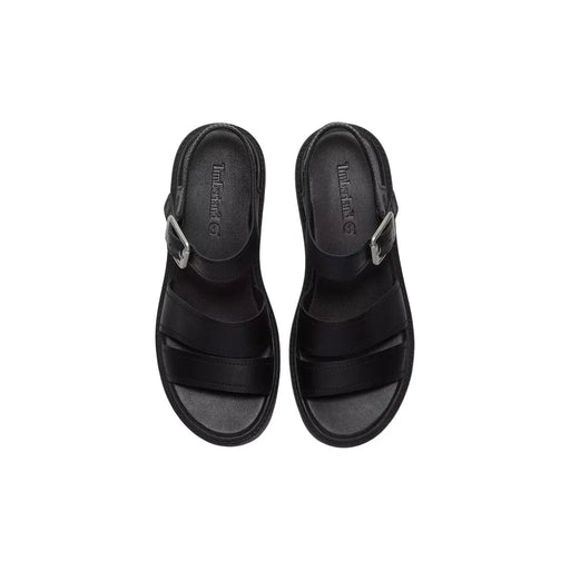 Timberland Sandales en cuir noir pour femmes, dotées de brides à boucle argentée et d'une semelle rembourrée pour plus de confort.