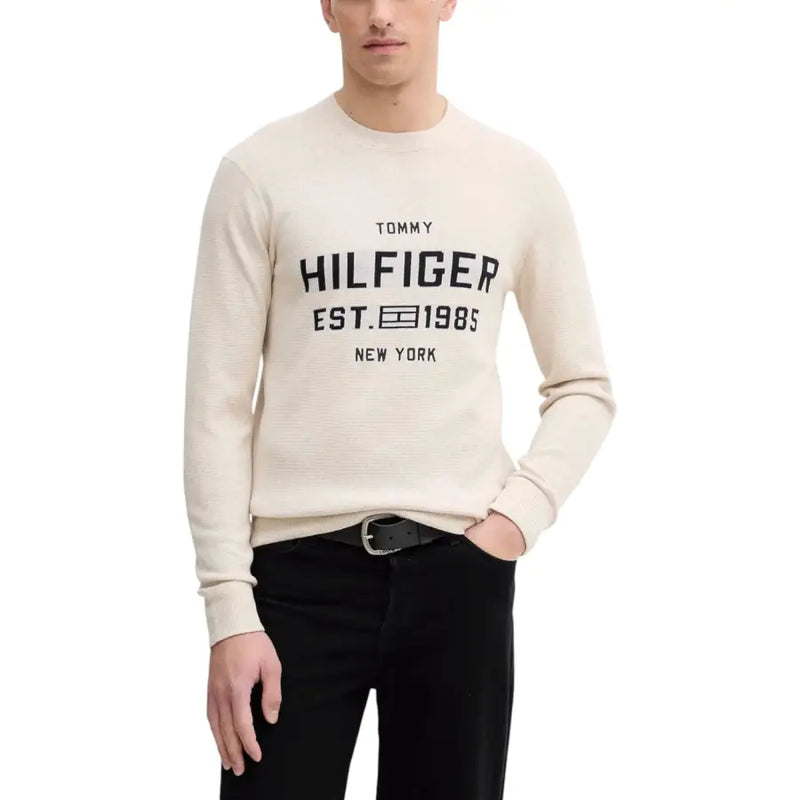 Tommy hilfiger cream crewneck sweatshirt with black logo.