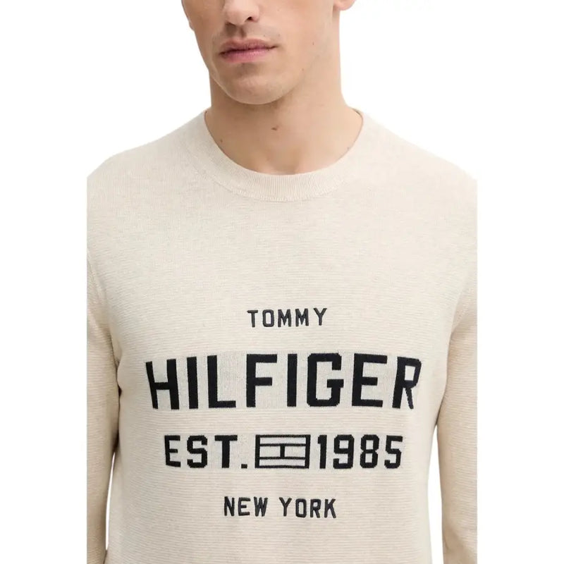 Tommy Hilfiger beige organic cotton crewneck sweater with black embroidered logo and est detail on front