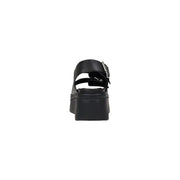 Tommy Hilfiger black leather wedge shoes for women featuring a single strap and silver buckle platform sandal
