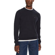 Tommy hilfiger navy blue crewneck sweatshirt with white trim and small logo.