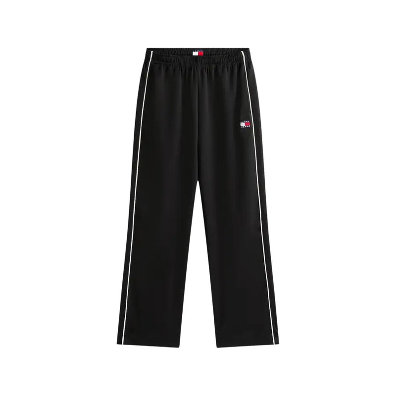 Tommy Hilfiger black women’s spring summer track pants with white side stripes and logo patch on the thigh