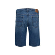 Blue denim shorts with brown leather patch and buttonhole detail.