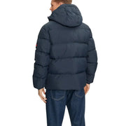 Navy blue puffer jacket with hood and logo on back, made of synthetic material.
