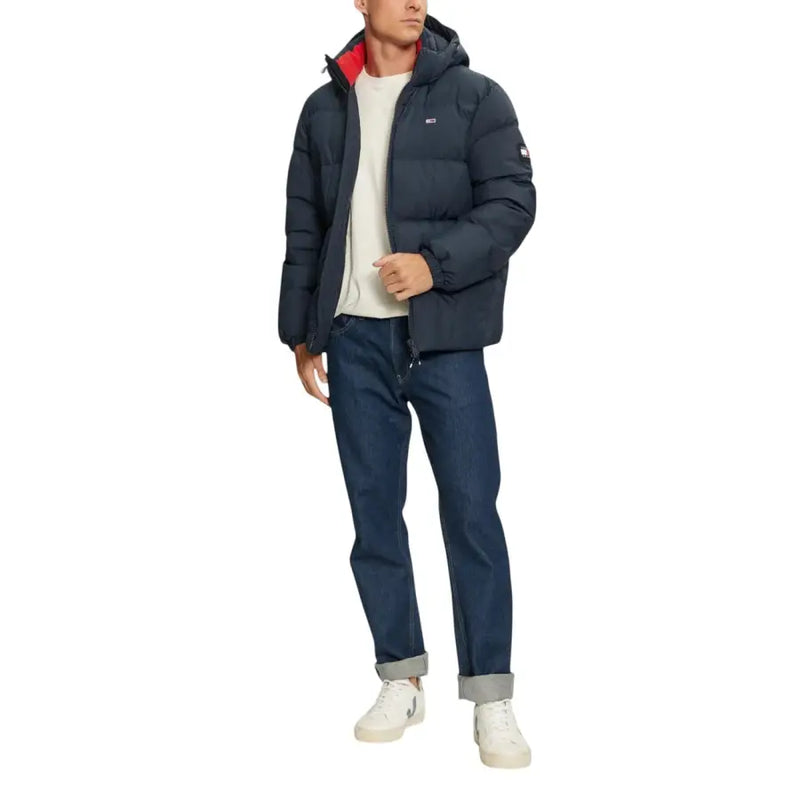 Tommy Hilfiger blue hooded nylon jacket for men with navy blue puffer exterior and red interior lining with logo