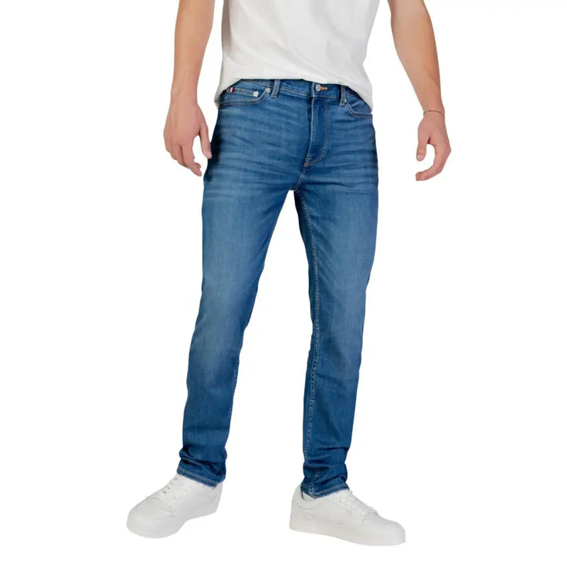 Blue denim jeans with white stitching and pockets, likely from a popular brand known for casual wear.