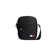 Tommy Hilfiger Sac bandoulière noir pour femme, style minimaliste, orné d'un écusson drapeau (vue de face).