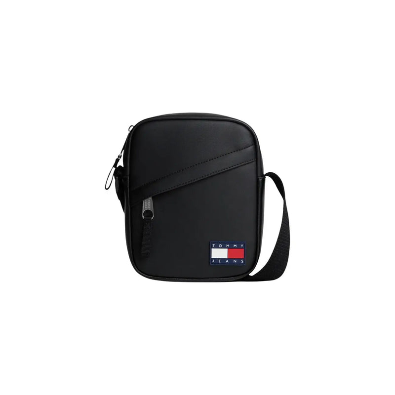 Tommy Hilfiger Sac bandoulière noir pour femme, style minimaliste, orné d'un écusson drapeau (vue de face).