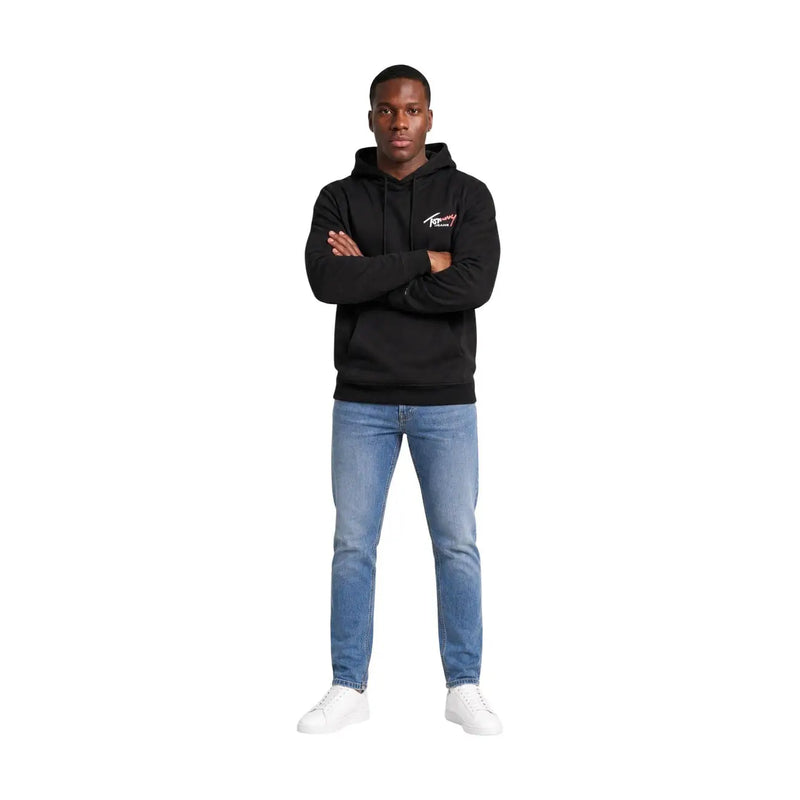 Sweat à capuche noir Tommy Hilfiger Jeans pour homme en coton biologique avec petit logo sur la poitrine, un incontournable du vestiaire décontracté classique.