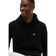 Tommy Hilfiger Jeans Sweat à capuche noir en coton biologique pour homme, avec un petit logo brodé sur la poitrine.