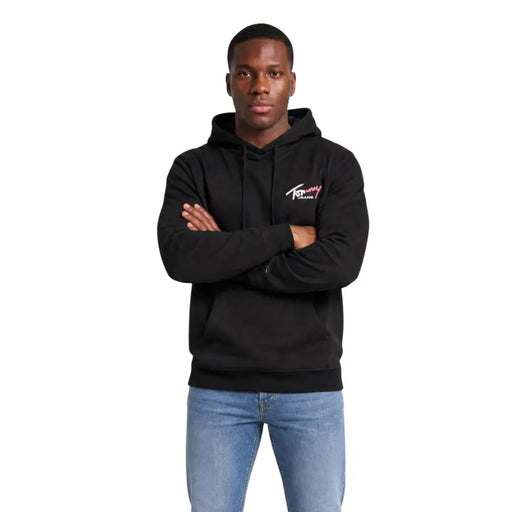 Sweat à capuche noir Tommy Hilfiger Jeans pour homme, en coton biologique, avec un logo discret sur la poitrine.