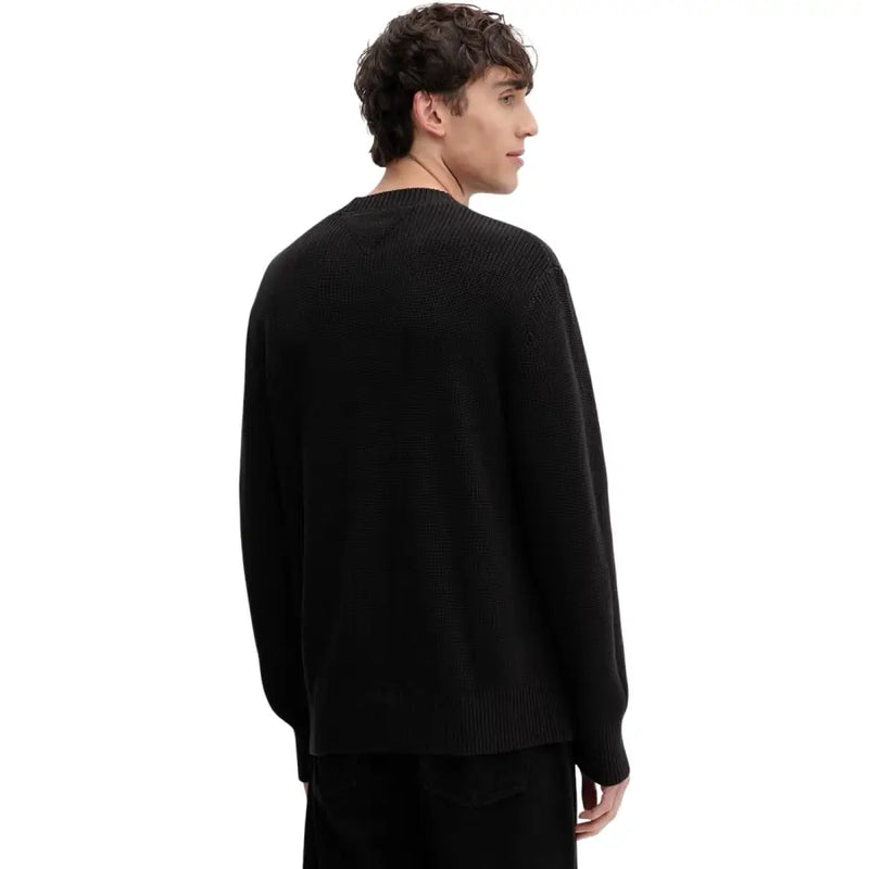 Pull noir à col rond en maille côtelée et manches longues, en coton biologique de Tommy Hilfiger Jeans hommes