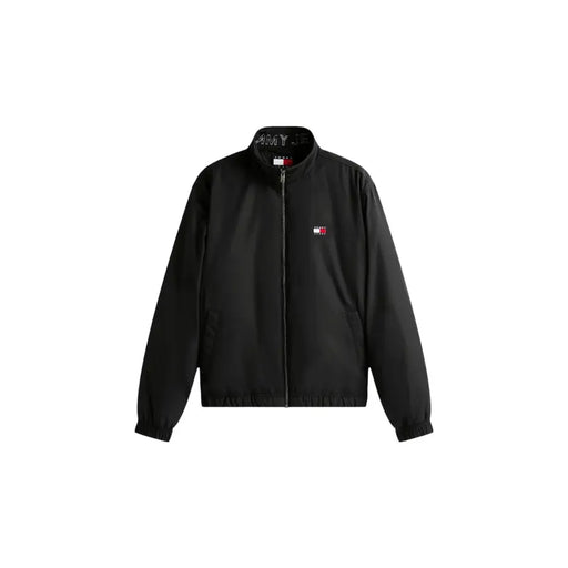 Tommy Hilfiger Blazer noir zippé en polyester pour homme, orné d'un logo brodé sur la poitrine et d'une inscription le long du col.