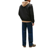Tommy Hilfiger blazer noir en polyester à fermeture éclair pour homme, avec capuche doublée en polaire beige, style bomber noir.