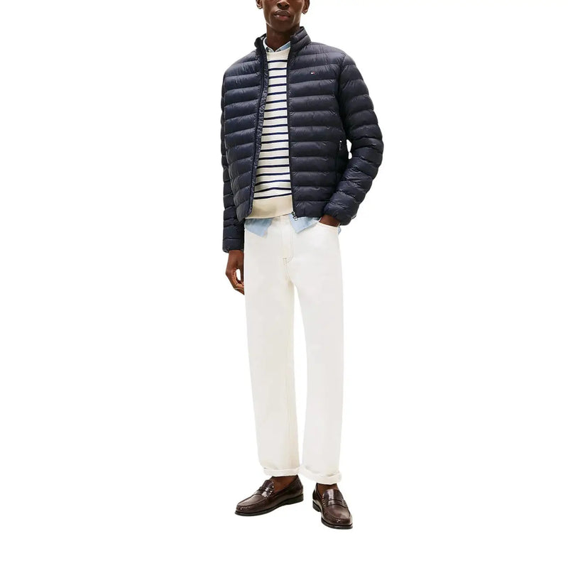 Veste zippée matelassée en nylon bleu marine pour homme par Tommy Hilfiger Jeans DM0DM20658 avec un design de type doudoune