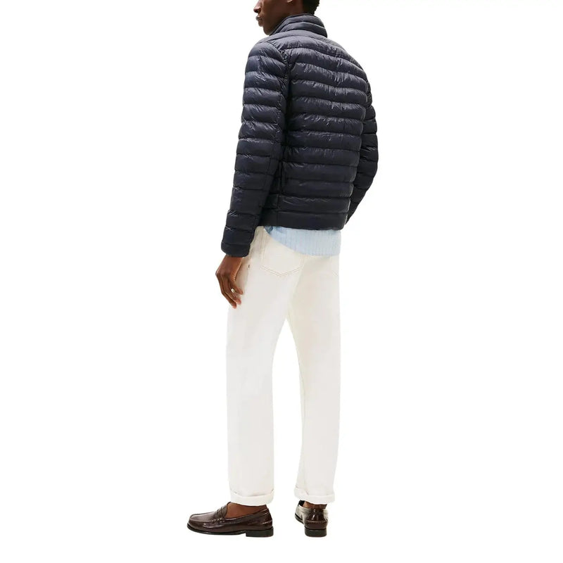 Veste zippée matelassée en nylon bleu marine pour homme par Tommy Hilfiger Jeans Modèle DM0DM20658 vu de face
