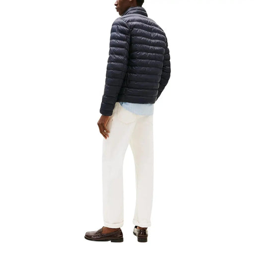 Veste zippée matelassée en nylon bleu marine pour homme par Tommy Hilfiger Jeans Modèle DM0DM20658 vu de face