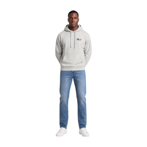 Tommy Hilfiger Sweat à capuche gris en coton biologique pour homme, orné d'un petit logo brodé et de cordons de serrage assortis sur la poitrine.