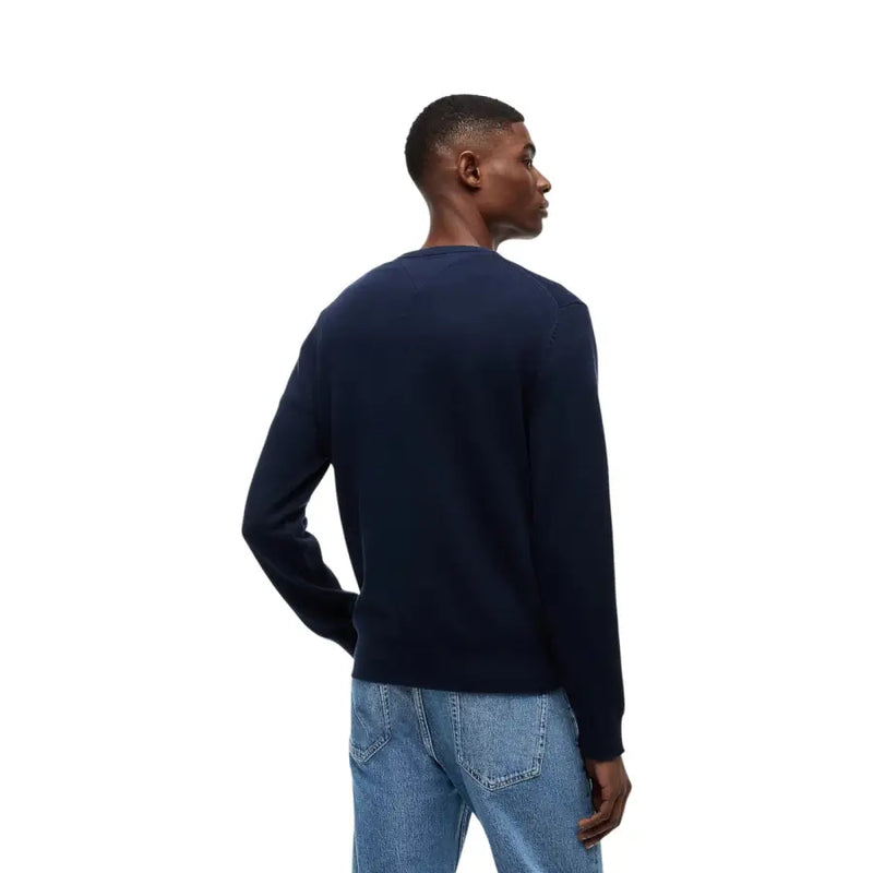 Pull bleu marine à col rond par Tommy Hilfiger Jeans tricots pour hommes en coton biologique bleu