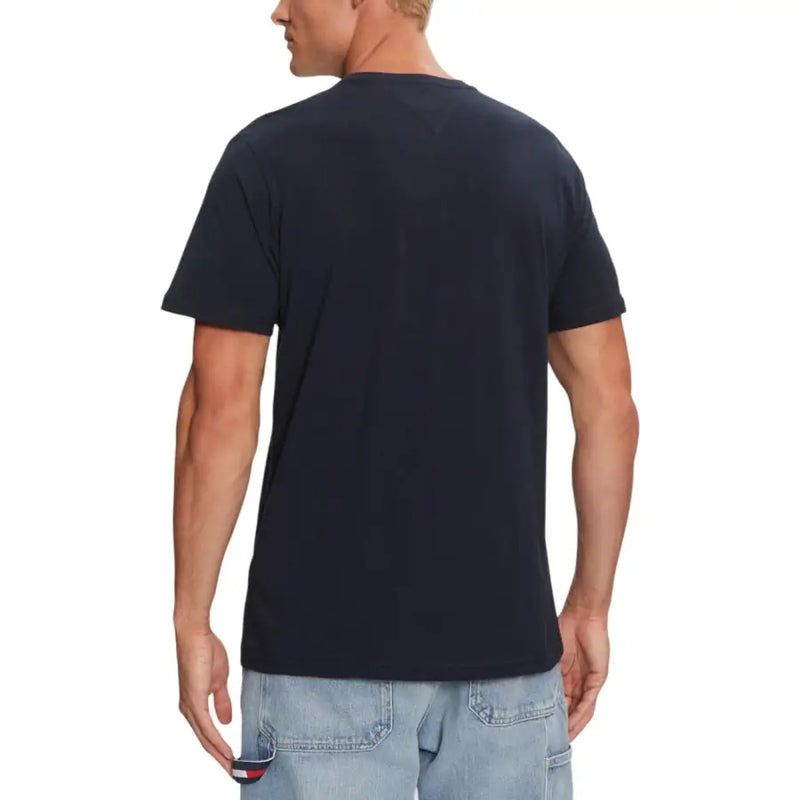 Men’s navy blue round neck cotton T-shirt paired with light wash denim carpenter shorts