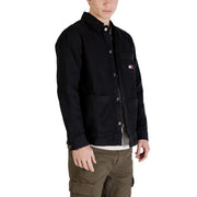 Black tommy hilfiger button-up work jacket with chest pocket and iconic flag logo featured in tommy hilfiger jeans men shirt
