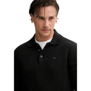 Polo slim en maille texturée noire avec petite taille Tommy Hilfiger logo en coton biologique pour hommes