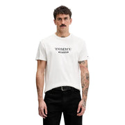 T-shirt Tommy Hilfiger Jeans pour homme, blanc, en coton, de couleur beige avec logo noir imprimé sur le devant