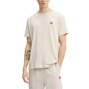 Beige Tommy Hilfiger Jeans men t-shirt with short sleeves and a small embroidered logo on the chest