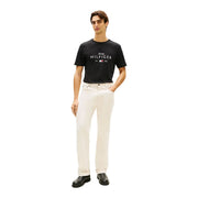 T-shirt noir en coton Tommy Hilfiger avec logo blanc et drapeau, pour homme, style décontracté.