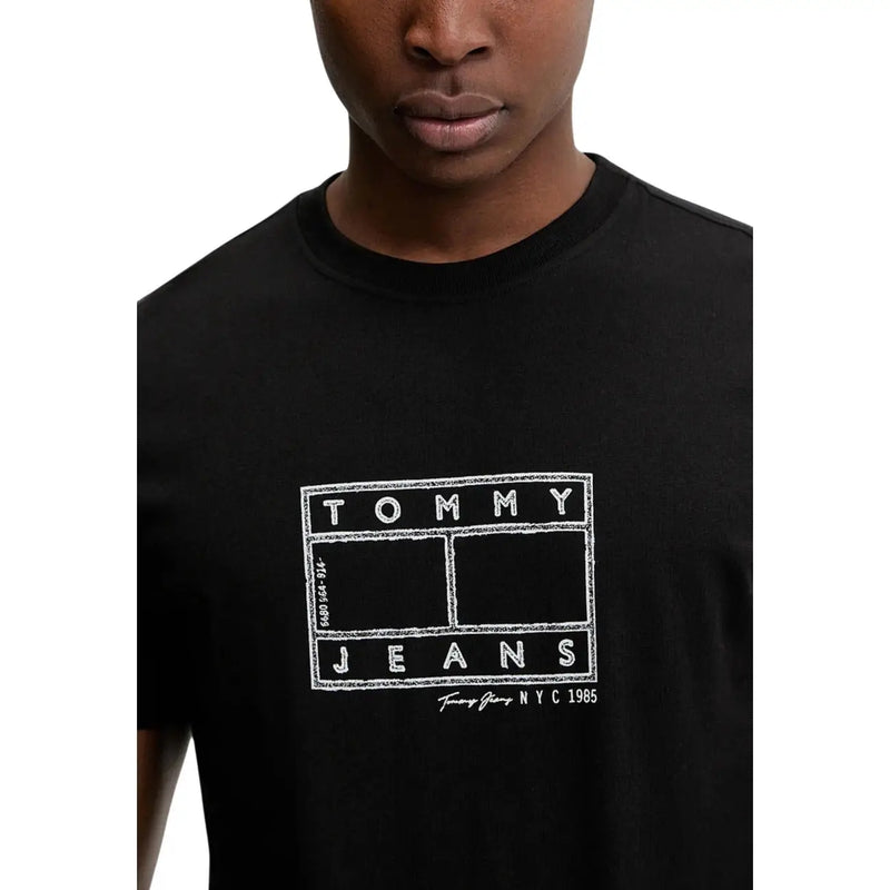 Black Tommy Hilfiger jeans men t-shirt with white chalk-style Tommy Jeans NYC 1985 logo on front