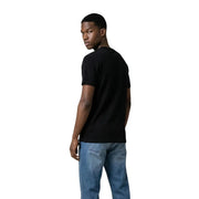 Black short-sleeved crew neck cotton t-shirt for men by Tommy Hilfiger Jeans ideal for casual wear