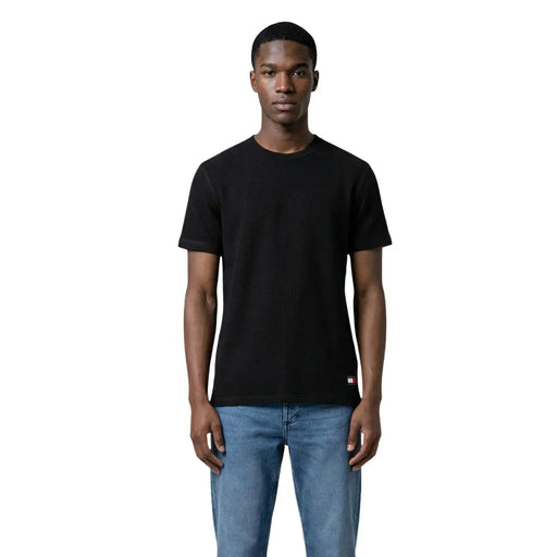 Tommy Hilfiger Jeans men t-shirt black short-sleeved crew neck with red white and blue logo tag on lower left side