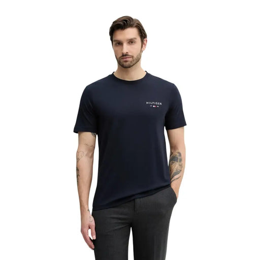 Navy blue Tommy Hilfiger short-sleeved cotton t-shirt with small white logo on left chest for men in size small