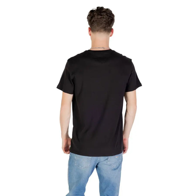 T-shirt noir à manches courtes et col rond en coton t-shirt pour hommes de Tommy Hilfiger Jeans collection de vêtements décontractés