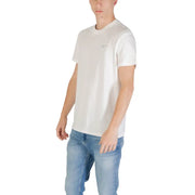 T-shirt blanc en coton à col rond t-shirt avec un petit logo brodé sur la poitrine gauche de Tommy Hilfiger Jeans collection homme