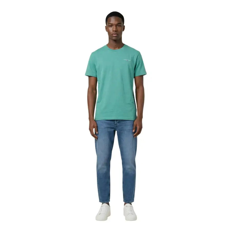 Tommy Hilfiger Jeans hommes t-shirt T-shirt en coton bleu sarcelle à manches courtes et logo brodé discret sur la poitrine gauche