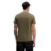 coton vert olive t-shirt avec un logo triangulaire discret à l'encolure, issu de la collection Tommy Hilfiger Jeans pour hommes
