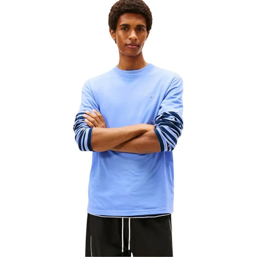 Light blue Tommy Hilfiger Jeans men t shirt with long sleeves, navy and white striped cuffs, made of organic cotton