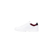White leather sneaker with burgundy and black accents, classic design.