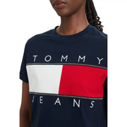 Navy blue Tommy Hilfiger Jeans women organic cotton t shirt with bold white and red flag logo and stitched detailing