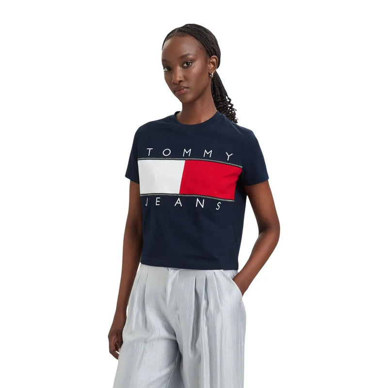 Navy blue Tommy Hilfiger Jeans women t-shirt made of organic cotton featuring a white and red flag logo on the chest
