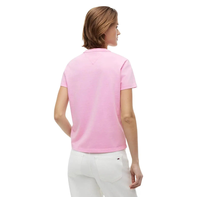 Back view of pink organic cotton polo shirt with classic collar and lacoste logo embroidered for tommy hilfiger jeans women