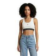 Tommy Hilfiger Jeans crop top blanc à col rond pour femme top avec un bracelet noir orné du logo de la marque