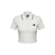 Tommy Hilfiger Jeans Polo blanc à manches courtes pour femme top en crème avec bordure de col noire et écusson logo brodé