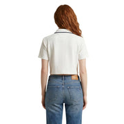 Polo crème à manches courtes avec bordures bleu marine et écusson en cuir griffé à la taille par Tommy Hilfiger Jeans