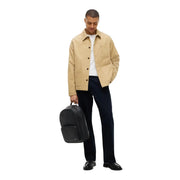 Tommy Hilfiger Sac à dos en cuir TH Foundation pour homme, noir, avec poche avant et top poignée, vue de face